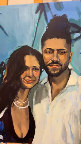 Couple portrait painted on canvas on an easel