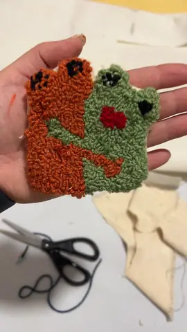 Green frog punch needle piece on orange
