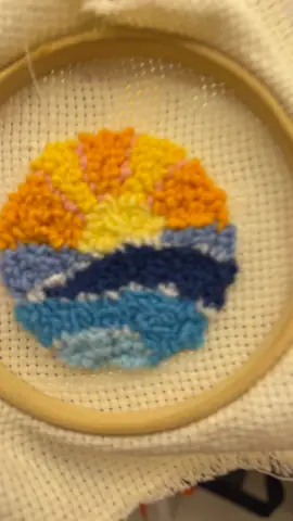 Sunset over the sea punch needle in a hoop
